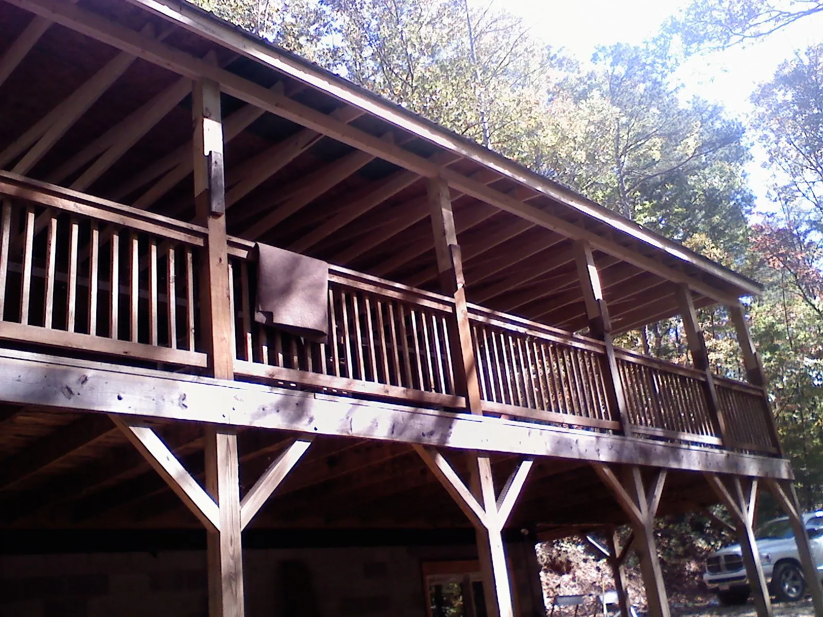 Timber framing under a new elevated porch and deck — Roof Leak Repair in Jessieville by Roofing Brothers